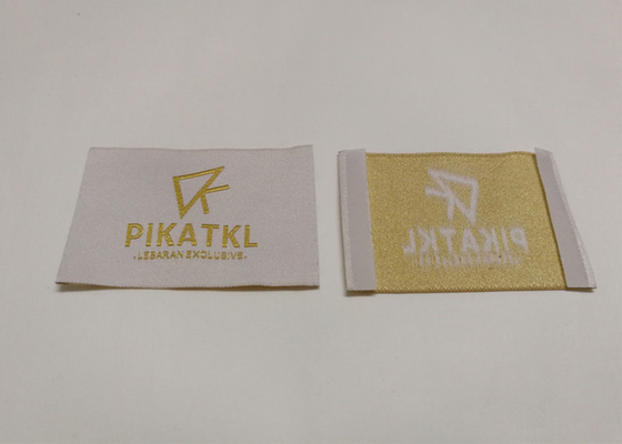 購入 個人化された縫う編まれたラベルは衣類のためのポリエステル/綿の糸材料に付けます online manufacture